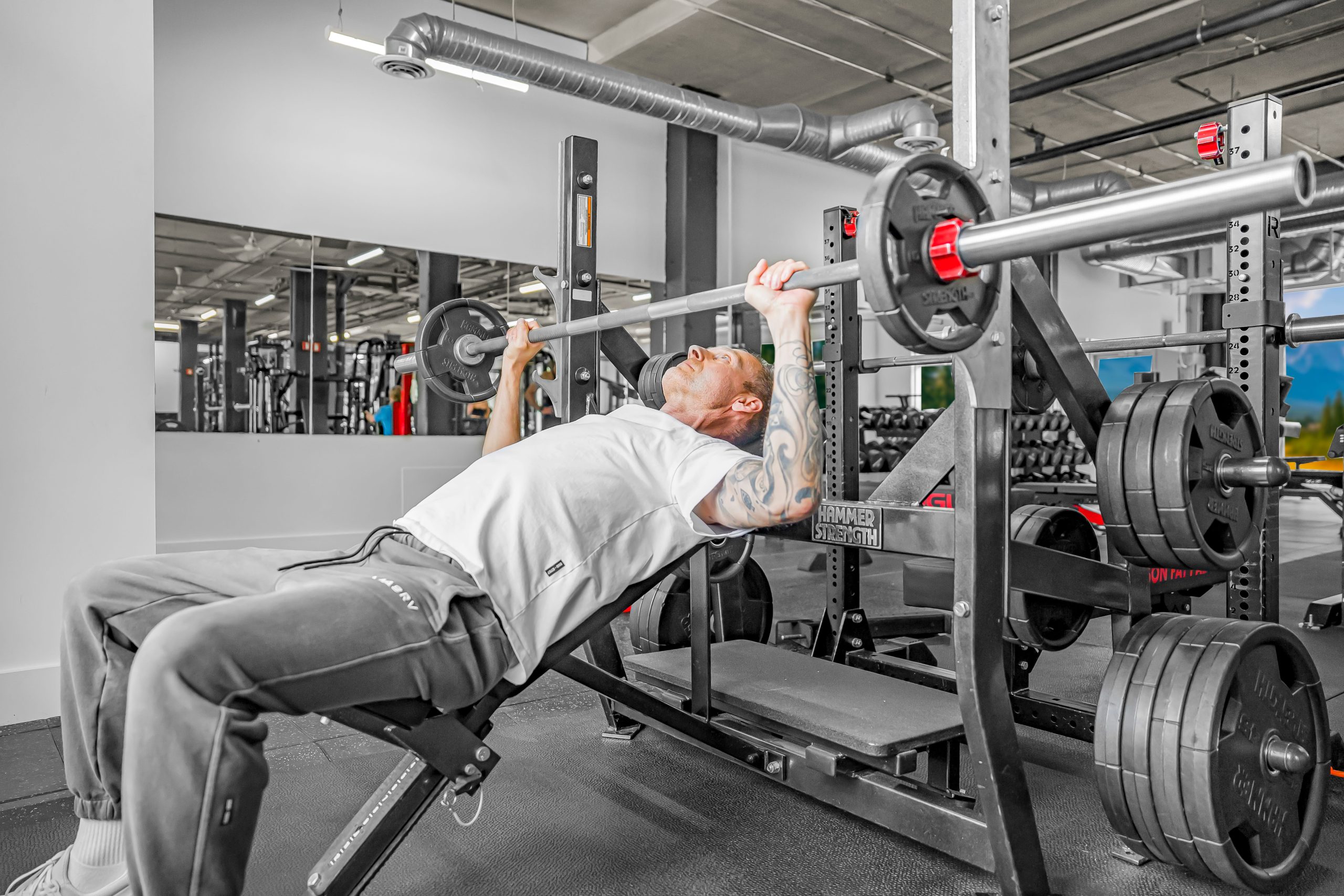 Incline bench press station at Athletic Evolution