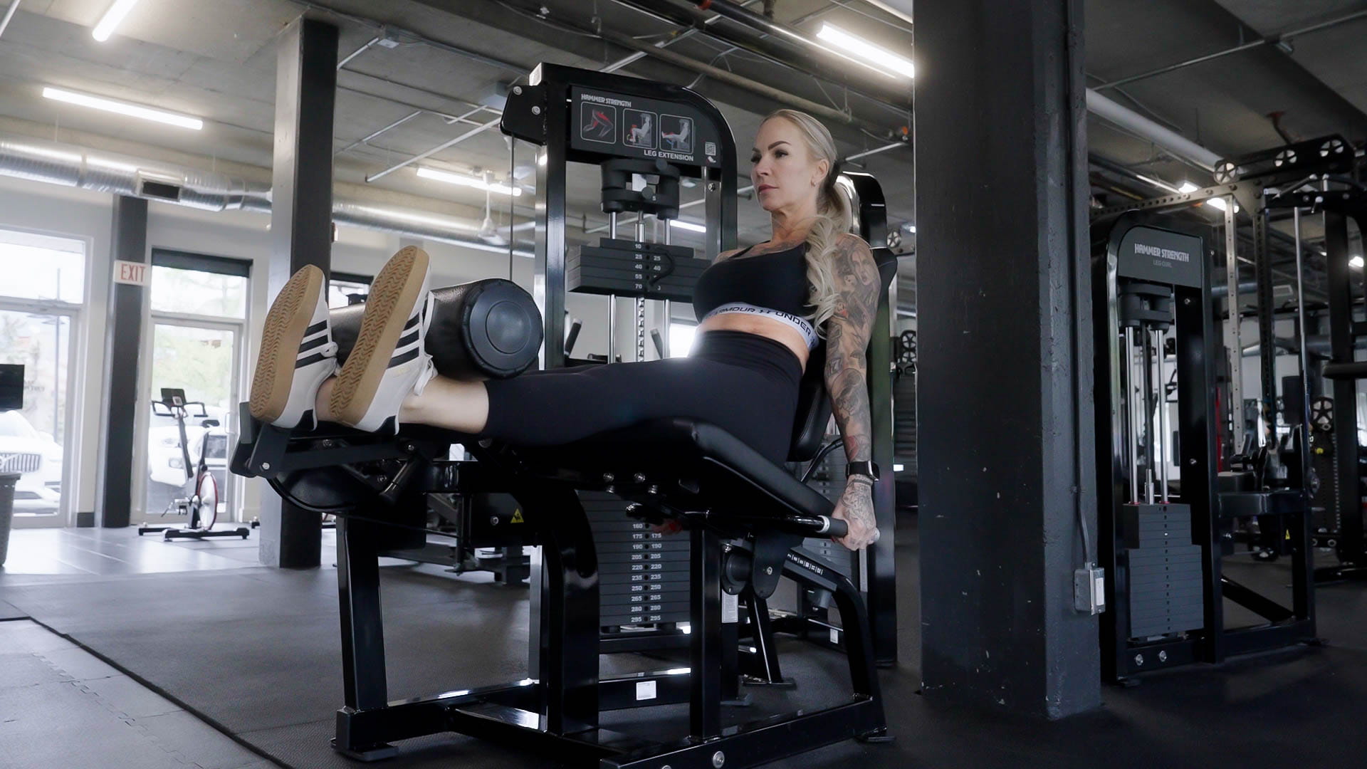 Leg extension machine at Athletic Evolution