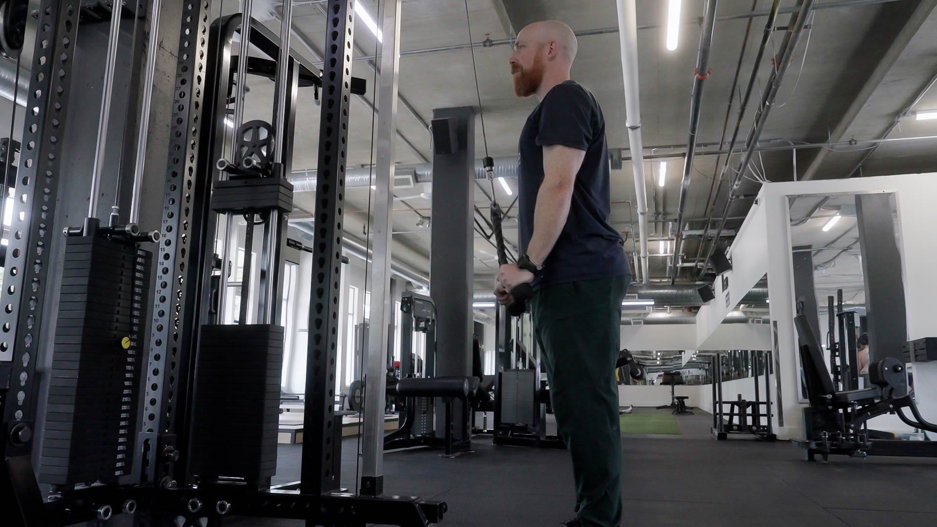 Cable tricep pushdown station at Athletic Evolution